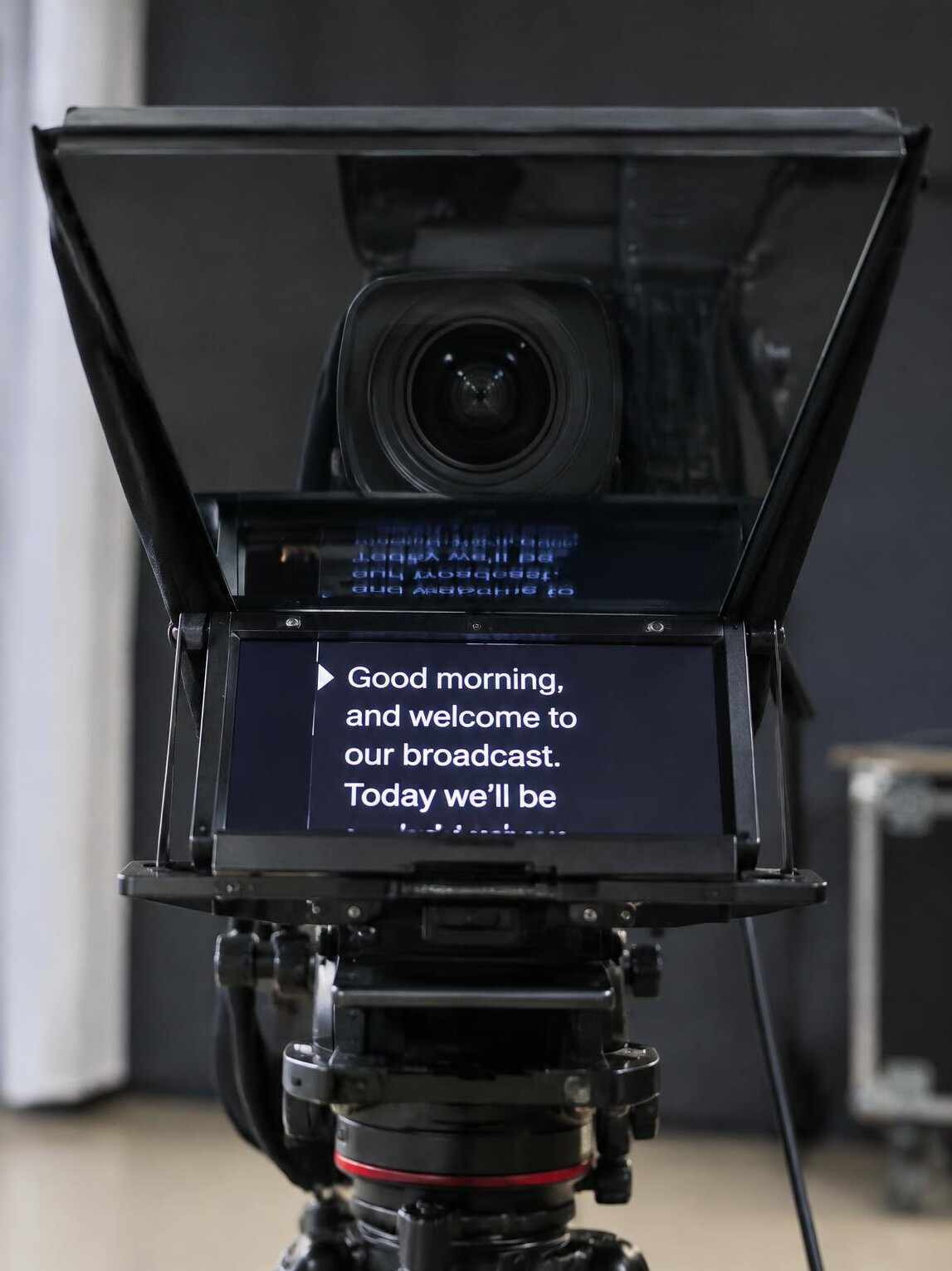 Autocue teleprompter glass with scrolling script text